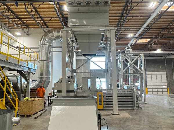 Engineered Recycling Systems — engineeredrecycling.com — news image representing trim and matrix removal efficiency for paper and corrugated converting lines, showing clean airflow and waste extraction concept for 2026 production trends