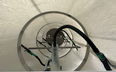 Interior view of Engineered Recycling Systems CCM® OCT filter showing antistatic suction nozzles and grounded hose system for fire-safe industrial dust collection