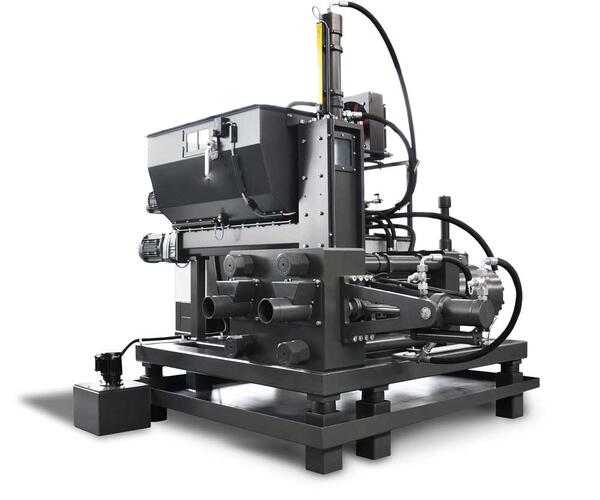 WEIMA TH 800 M Briquette Press utilized by Engineered Recycling Systems — high-pressure hydraulic machine designed for compacting metal shavings, chips, and turnings into dense 80 mm briquettes, featuring Siemens PLC control, fluid recovery system, and re