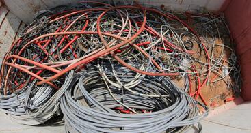 crap wires prepared for recycling by ERS — assorted copper and aluminum wires including insulated, bare bright, and multi-strand types, processed through chopping and separation systems for high-purity metal recovery