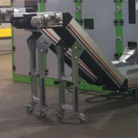 “Material handling conveyor systems utilized by Engineered Recycling Systems — versatile and durable conveyors designed for efficient transport of scrap metals, plastics, cardboard, and industrial waste across processing stages, featuring slider beds, cha