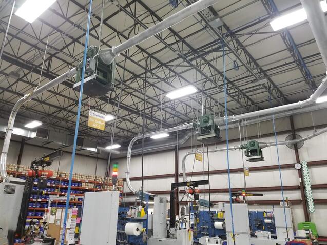 Overhead ERS system for matrix and trim extraction in a label manufacturing facility