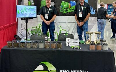 Jeffery Wair and Mark Haire at ERS Booth 315 during ScrapExpo 2025 in Louisville, discussing profitable material recovery and the RescueRevenue mission