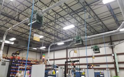 Overhead ERS system for matrix and trim extraction in a label manufacturing facility