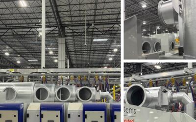 Dust collection hoods installed above MaxPro Rotary Die Cutter for targeted scrap and dust capture by Engineered Recycling Systems