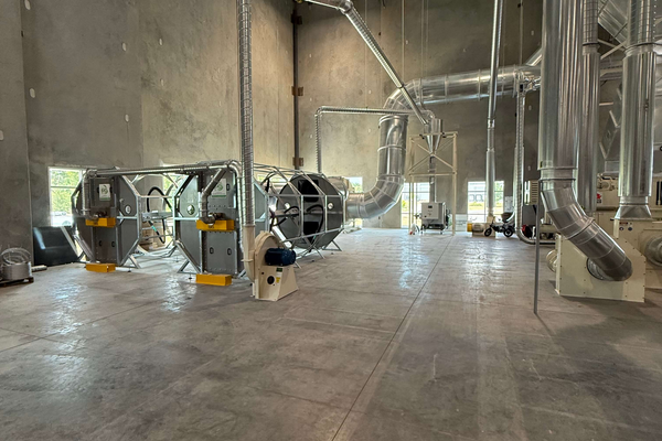 ERS installation of CCM OCT Filter System with ductwork and industrial fans on-site, illustrating turnkey dust collection setup and precision airflow integration in a manufacturing environment