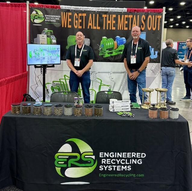 Jeffery Wair and Mark Haire at ERS Booth 315 during ScrapExpo 2025 in Louisville, discussing profitable material recovery and the RescueRevenue mission