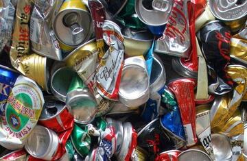 Aluminum cans prepared for recycling by Engineered Recycling Systems — clean, empty beverage containers staged for processing, featuring high-density baling and precision separation systems designed to recover pure aluminum with minimal contamination, opt