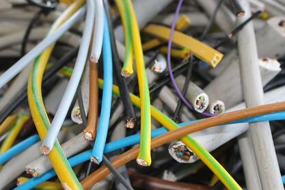 Mixed cable recycling systems utilized by Engineered Recycling Systems — versatile processing line designed to handle a wide range of cable types including copper, aluminum, armored, and automotive wires, featuring pre-shredders, granulators, separators,