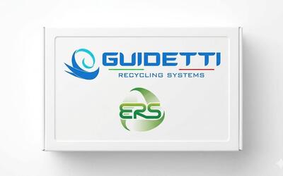 Guidetti Robi dry separation table and PMG pre-shredder side-by-side in a clean U.S. recycling plant with a technician inspecting the machines.