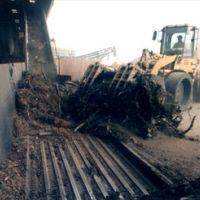 Walking Floor conveyor systems utilized by Engineered Recycling Systems — hydraulically driven horizontal conveyors featuring reciprocating floor slats for automated bulk material movement, ideal for transporting scrap metals, plastics, RDF, biomass, and