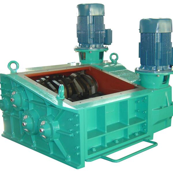 Engineered Recycling Systems Erdwich three-shaft shredder — high-throughput material reduction system featuring staggered cutter shafts and a sweeper shaft for continuous shredding of bulky, solid feedstock with precision sizing via perforated screen bask
