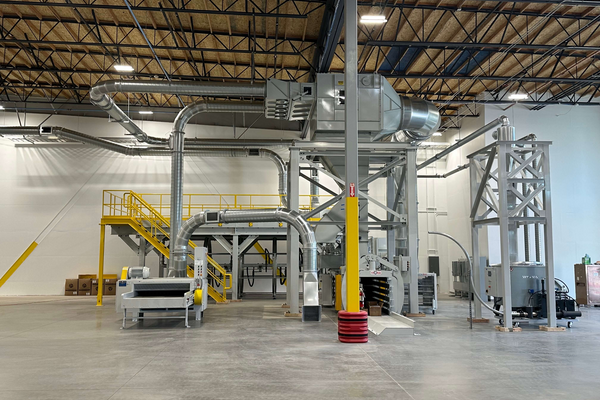 Engineered Recycling Systems LLC Low Profile Separator using controlled airflow to separate conveyed material from the airstream for clean discharge.