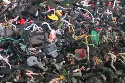 Automotive cable recycling systems utilized by Engineered Recycling Systems — advanced processing line designed to shred, strip, and separate copper and aluminum from vehicle wiring harnesses, featuring heavy-duty pre-shredders, granulators, and magnetic
