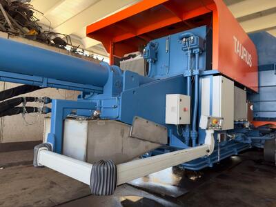 TAURUS BLULINE equipment shown in a metal‑recycling environment.