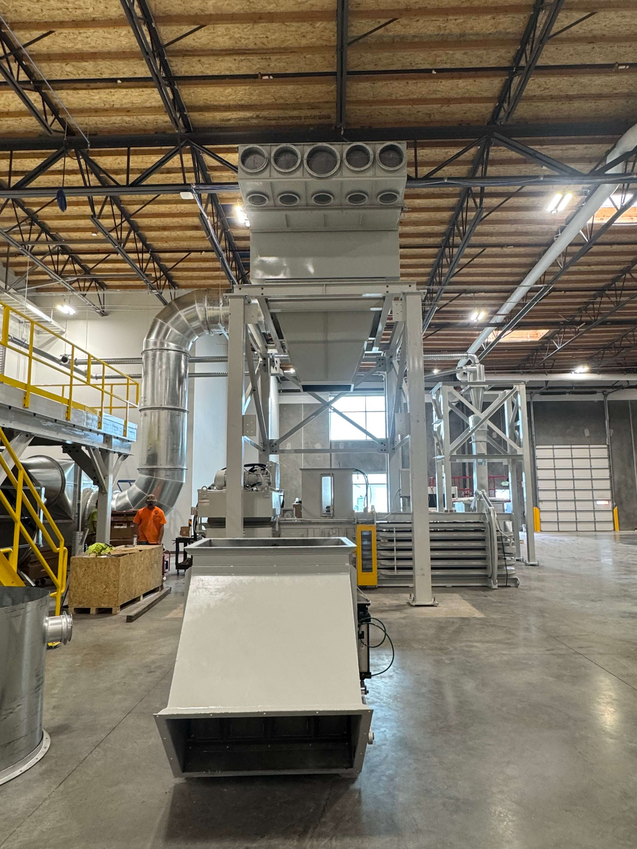 Engineered Recycling Systems — engineeredrecycling.com — news image representing trim and matrix removal efficiency for paper and corrugated converting lines, showing clean airflow and waste extraction concept for 2026 production trends