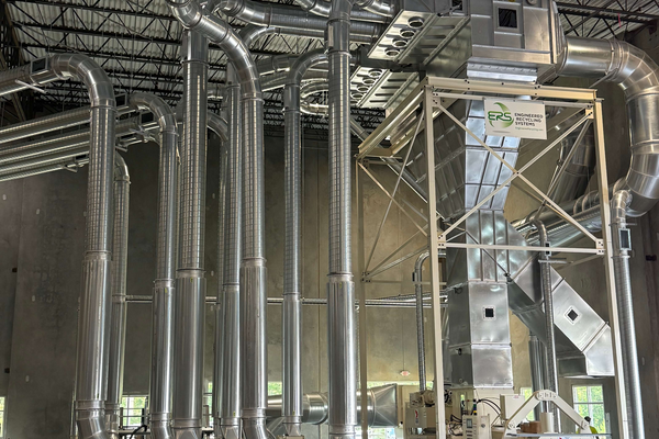 Engineered Recycling Systems Low Profile Separator mounted over a baler for efficient trim and scrap separation in tight pressroom spaces