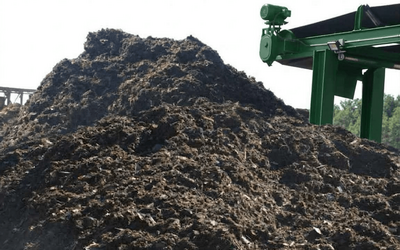 Shredder fines piling up at a scrap yard with no clear plan to recover the metal in it