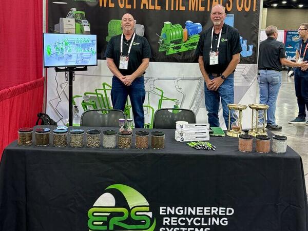 Jeffery Wair and Mark Haire at ERS Booth 315 during ScrapExpo 2025 in Louisville, discussing profitable material recovery and the RescueRevenue mission