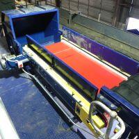 Eddy Current Separator utilized by Engineered Recycling Systems — advanced non-ferrous metal separation system featuring high-speed magnetic rotor that induces eddy currents in conductive materials like aluminum and copper, repelling them from mixed scrap