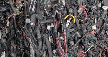 ASR scrap processed by ERS — automotive shredder residue containing mixed materials like plastics, rubber, glass, and metals, refined through advanced separation systems for high-purity metal and plastic recovery