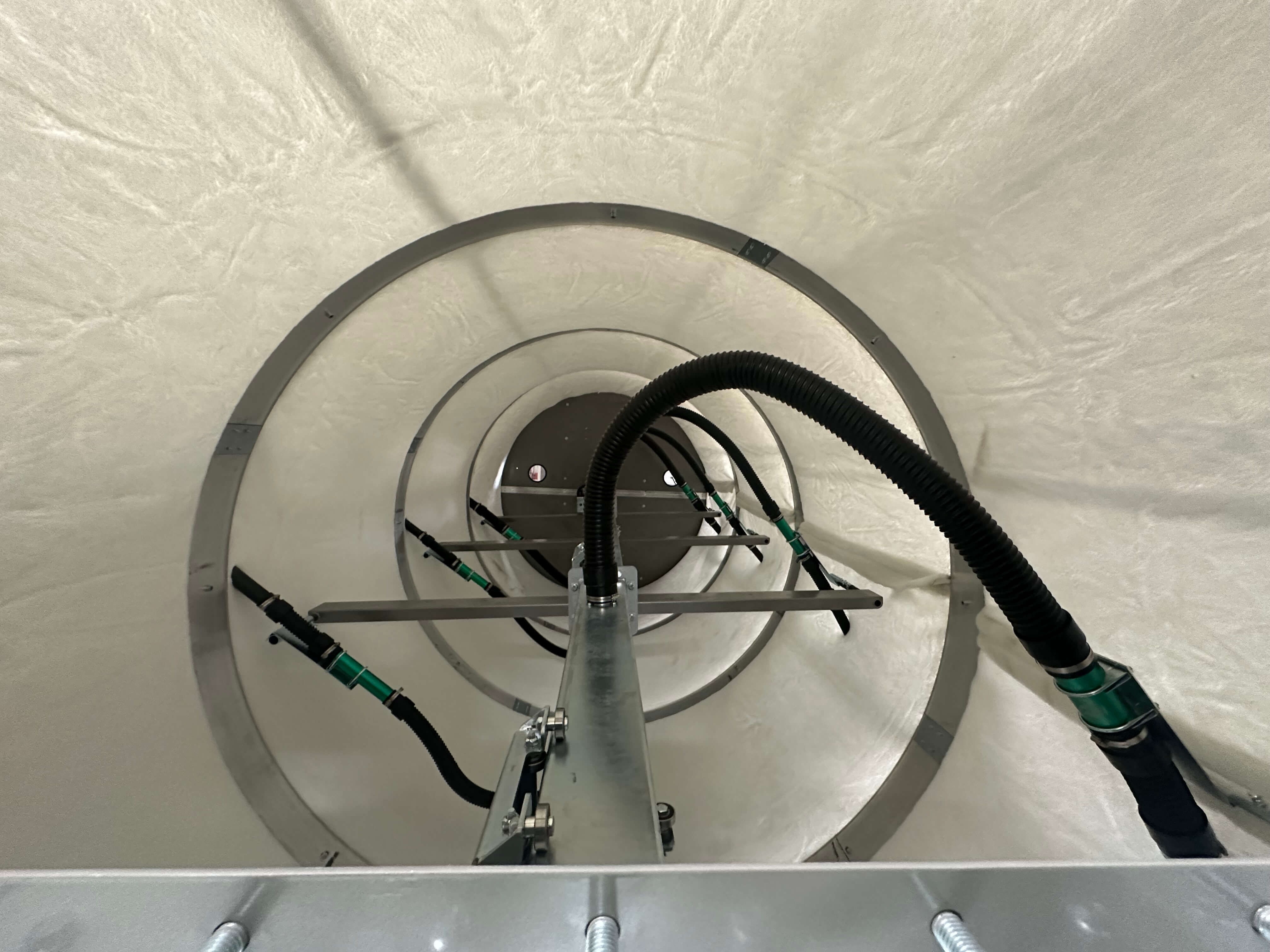 Interior view of Engineered Recycling Systems CCM® OCT filter showing antistatic suction nozzles and grounded hose system for fire-safe industrial dust collection